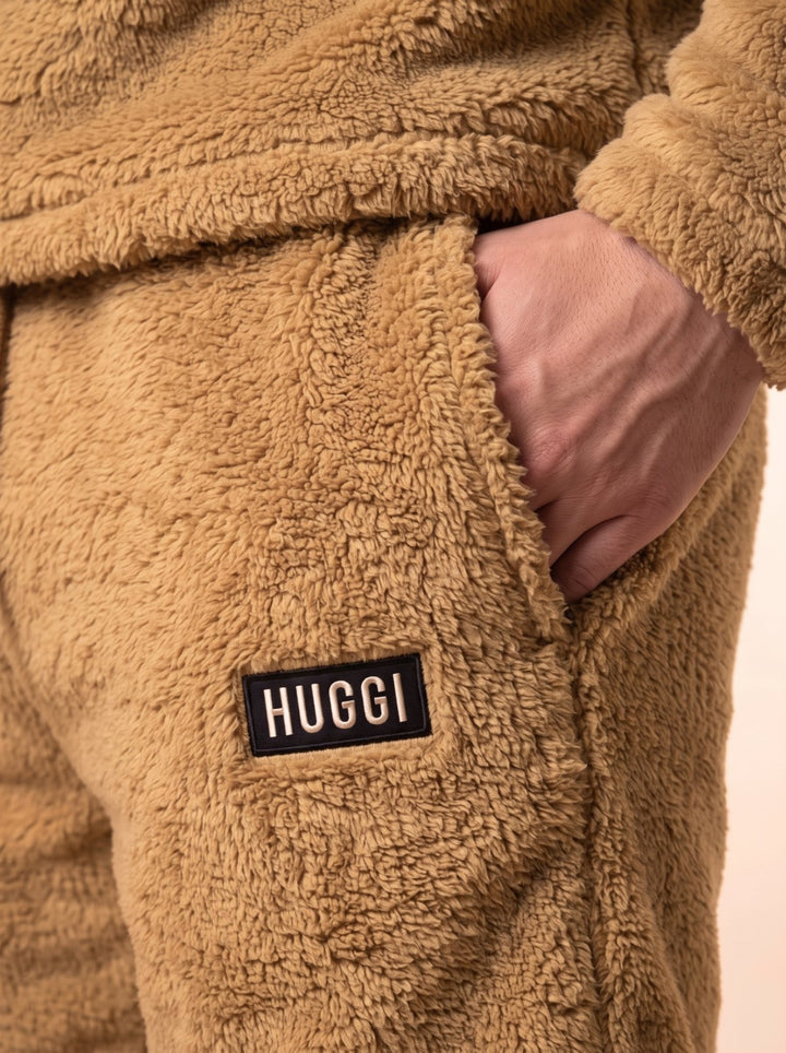 Close-up of the hidden side pocket and hip patch on the Brown shorts