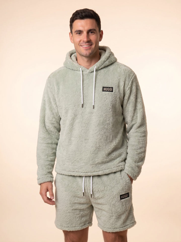 Huggi Fleece Two-Piece Set in Light Green – front view, model smiling model: Luke is 6&
